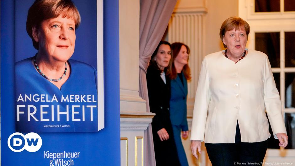 Merkel defends controversial decisions at book launch