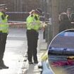 Mother of schoolgirl, eight, screamed 'My baby's been shot!' after she was hit in crossfire as police hunt Ladbroke Grove gunman who targeted her and man, 34