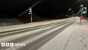 Overnight snowfall shuts schools and hits travel