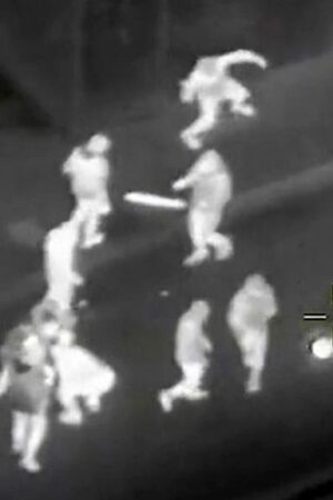 Police helicopter footage shows firework attacks as 19 arrested