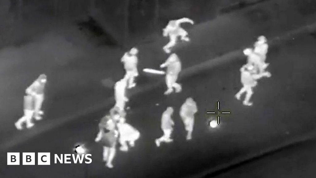 Police helicopter footage shows firework attacks as 19 arrested