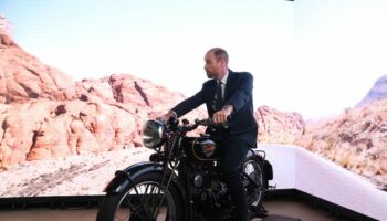 Prince William takes 'any excuse' to jump on motorbike during re-arranged royal visit