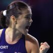 Great Britain's Emma Raducanu celebrates winning a point during her Billie Jean King Cup match against Germany's Jule Niemeier