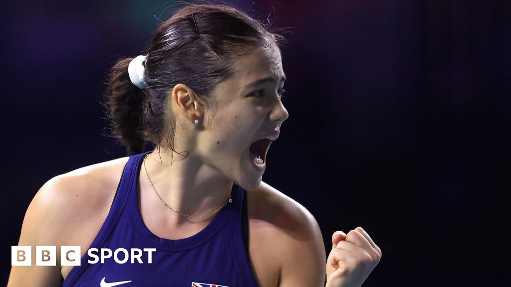 Great Britain's Emma Raducanu celebrates winning a point during her Billie Jean King Cup match against Germany's Jule Niemeier