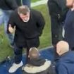 Roy Keane furiously confronts fan who was abusing him following Man United's 1-1 draw at Portman Road... after group of supporters shout 'F*** YOU' at former Ipswich manager