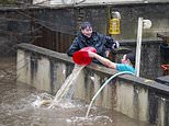 Storm Bert batters Britain: Hundreds of flights are cancelled as strong winds sweep across the country and downpours cause 'unprecedented' flooding - with the wild weather already claiming four lives