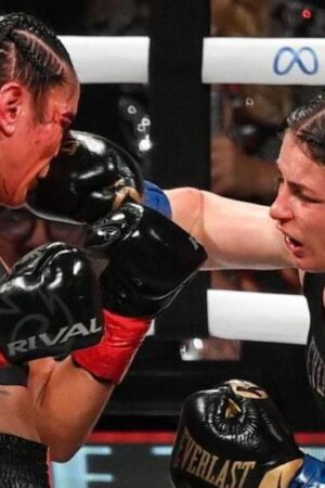 Amanda Serrano is punched in the face by Katie Taylor