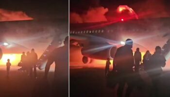 Terrifying moment passenger jet bursts into flames after horror landing in high winds