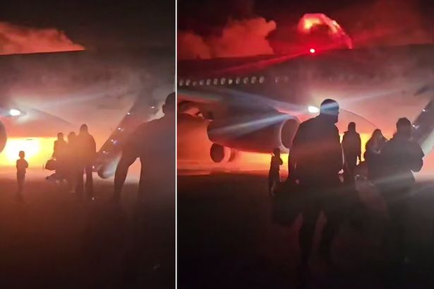 Terrifying moment passenger jet bursts into flames after horror landing in high winds