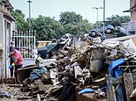 The moment deadly floods struck Valencia: How huge swells appeared from nowhere trapping people in their basements and cars - as Spain continues to reel from deadly storms and torrential rain lashes Barcelona