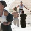 Tulisa makes a dramatic I'm A Celeb entrance as she parachutes from a helicopter onto Byron Bay beach to meet a beaming Coleen Rooney and their fellow campmates