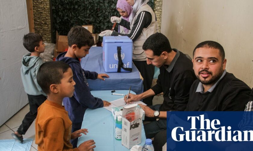 Vaccination centre and aid official’s car bombarded in Gaza, says UN