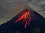 Volcanic eruption kills at least ten as fireballs crash down on villagers in Indonesia