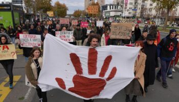 Thousands march in Serbia to mark 1 month since a roof collapse killed 15 people