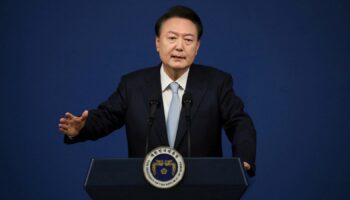 FILE PHOTO: South Korean President Yoon Suk Yeol delivers a speech during his briefing on state affairs at a press conference at the presidential office in Seoul, South Korea, August 29, 2024. Chung Sung-Jun/Pool via REUTERS/File Photo