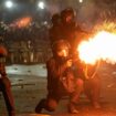 Police fire tear gas towards protesters in the Georgian capital Tbilisi. Pic: AP