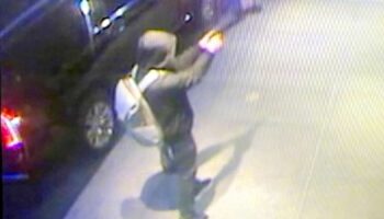 CCTV shows masked man pull gun on healthcare boss moments before targeted killing in New York