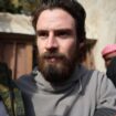 Syria - live: US man Travis Timmerman found after months in Assad prison as rebels set to suspend constitution