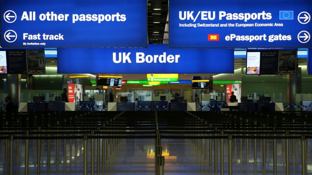 UK Border control is seen in Terminal 2 at Heathrow Airport in London June 4, 2014. REUTERS/Neil Hall