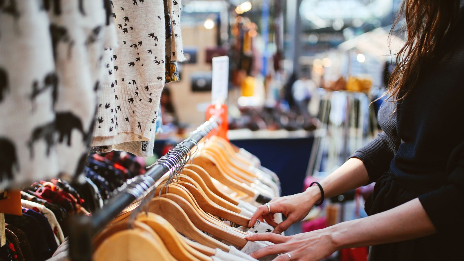 Woman shopping in East London second hand marketplace