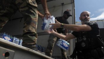 Water being distributed to locals in the aftermath of the cyclone