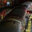 FILE - New York Police officers clear a train at the Coney Island Stillwell Avenue Terminal, May 5, 2020, in the Brooklyn borough of New York. (AP Photo/Frank Franklin II, file)