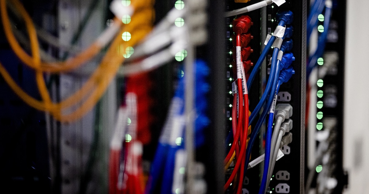 Interior of a server room in the American the Internet connection and data center company Equinix in Amsterdam on July 14, 2021. (Photo by Sem van der Wal / ANP / AFP) / Netherlands OUT