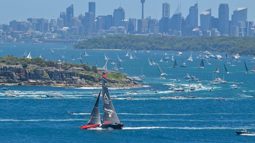 Yachts set off from Sydney Harbour to start the Sydney to Hobart yacht race. Pic: AP