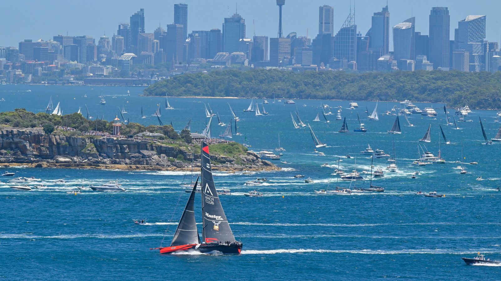 Yachts set off from Sydney Harbour to start the Sydney to Hobart yacht race. Pic: AP