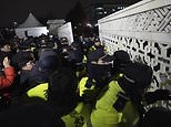 Chaos in South Korea: Civilians clash with military and choppers land on parliament as president stuns the world by declaring MARTIAL LAW, claiming lawmakers sympathetic to Kim Jong Un are subverting parliament