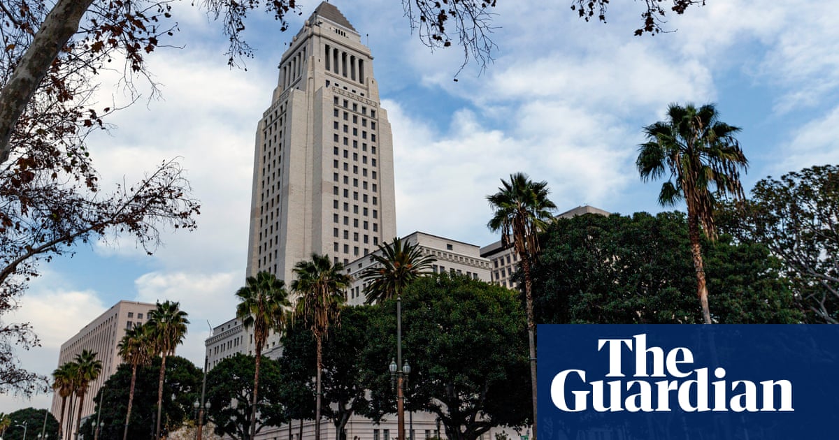 FBI searches home of LA deputy mayor accused of making city hall bomb threat