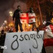 Georgia's PM hits back as protests and resignations intensify