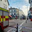 Girl, 12, arrested over Debenham's fire after blaze rips through Canterbury store