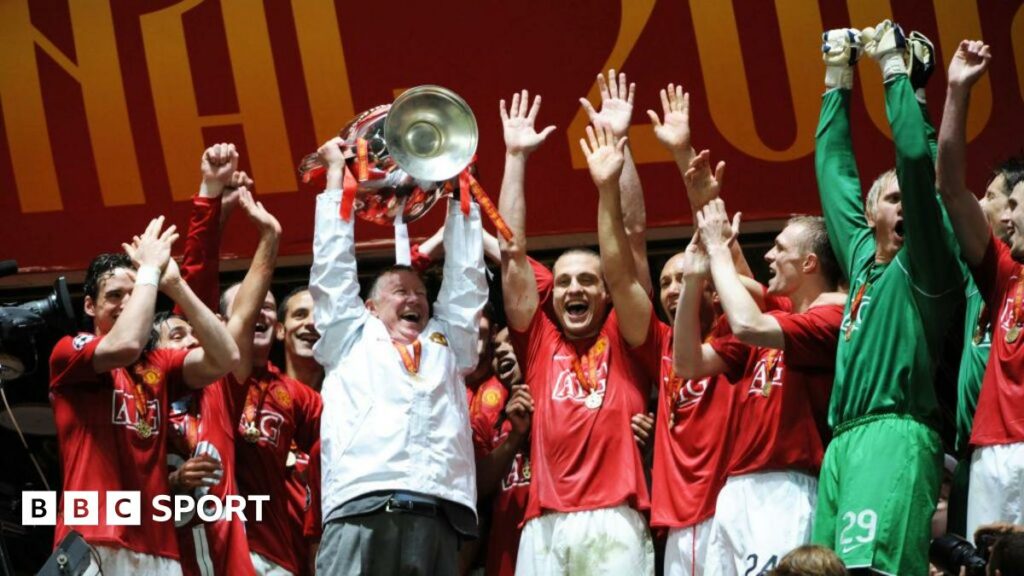 Sir Alex Ferguson lifting the Champions League trophy