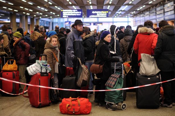 Hundreds of Brits stranded days before Christmas with flights axed as UK lashed by 82mph winds