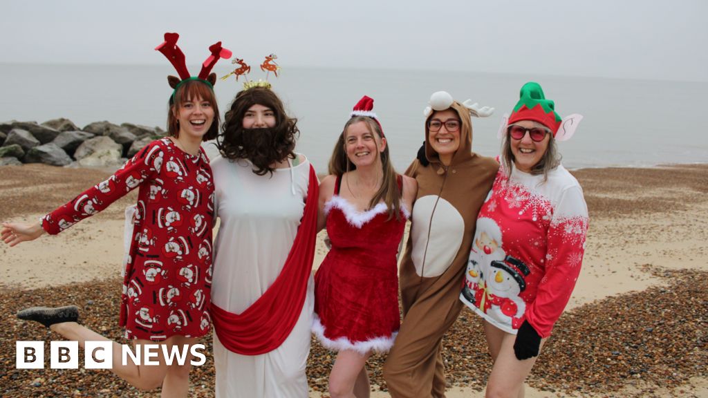 Hundreds of swimmers take Christmas Day North Sea dip