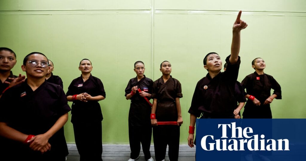 Kung fu nuns show off martial art skills at monastery reopening in Nepal