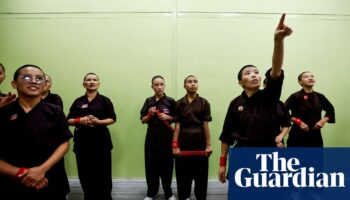 Kung fu nuns show off martial art skills at monastery reopening in Nepal