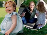 Lilibet's flowing long hair steals the show in Harry and Meghan's new holiday card after proud dad revealed she has been 'blessed with her mother's thick hair'