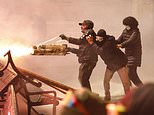 Mayhem in Georgia as protesters armed with home-made MACHINE GUN blasts riot police with fireworks: Chaos deepens as pro-EU campaigners and cops clash in fiery street battles, with over 100 arrested