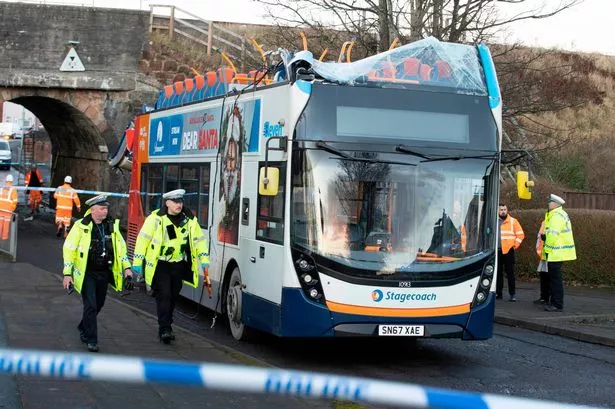 Roof sheared off double-decker bus as horror smash puts eight in hospital