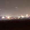 Shocking moment 'Putin's mystery drones' are spotted in the night sky over US airbase in Britain that is being lined up to house nuclear weapons