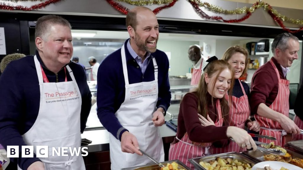 William serves Christmas lunch at shelter he visited with Diana