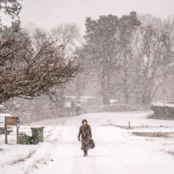 UK weather live: Three day snow warning for most of England as floods lead to major incident in Manchester