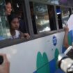 Released prisoners, in a bus, are welcomed by family members and colleagues after they left Insein Prison Saturday, Jan. 4, 2025, in Yangon, Myanmar, as the military government has released more than 6,000 prisoners and has reduced other inmates... sentences as part of a mass amnesty to mark the 77th anniversary of independence from Britain. (AP Photo/Thein Zaw)