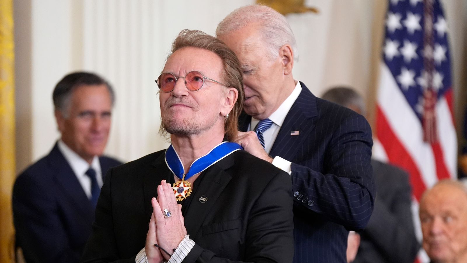 President Joe Biden presents Bono with the Presidential Medal of Freedom. Pic: AP