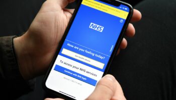 File photo dated 28/04/21 of a person holding a mobile phone displaying the NHS app. More NHS patients who need elective care will be able to decide where they are treated under new Government plans to slash waiting lists. Issue date: Sunday January 5, 2025.Kirsty O'Connor/PA Wire