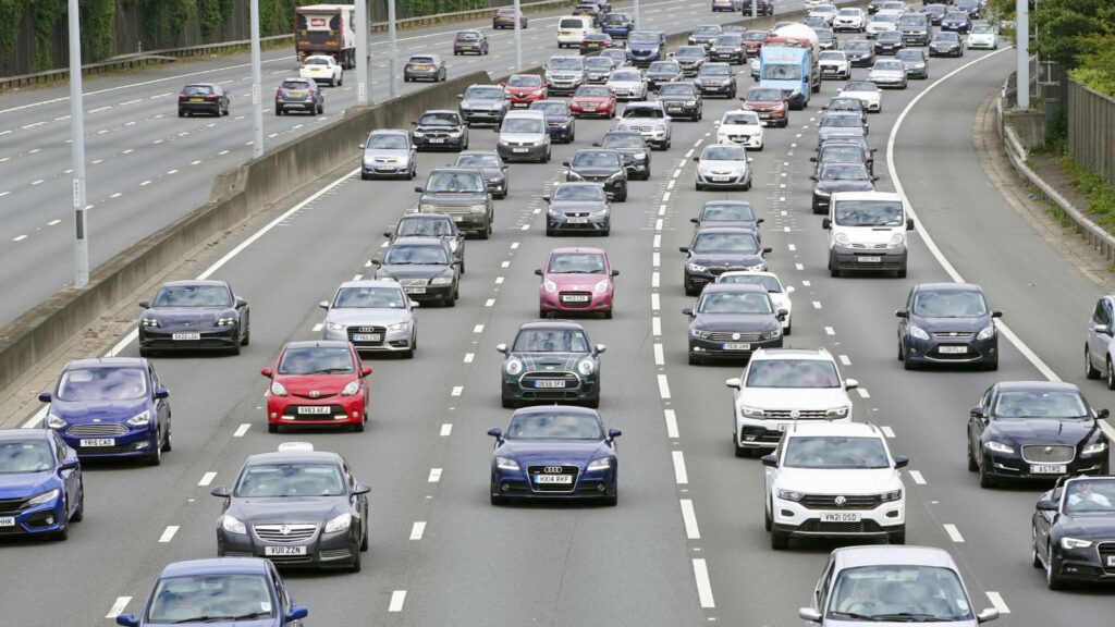 File photo dated 03/06/22 of vehicles on the M25 motorway near Egham, Surrey. The highest-earning 0.1% of Britons cause 12 times more greenhouse gas emissions from their transport than the average person, a report suggests. Research by the IPPR think tank found that half of all transport emissions come from just a sixth of the population in Great Britain, while the most polluting 10% of the population are responsible for 42% of emissions. Issue date: Wednesday May 29, 2024.