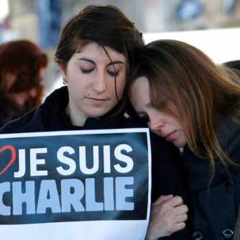 People pay tribute to the victims of the satirical newspaper "Charlie Hebdo", in Marseille, southern France, Thursday, Jan. 8, 2015. Pic: AP