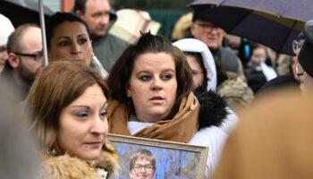 Severine (C), the mother of 13-year old Lucas, and relatives are pictured during a rally in his tribute following his suicide in Epinal, eastern France, on February 5, 2023. Severine (whose family name is not made available for privacy) said that the harassment and bullying suffered by his son at school because of his homosexuality had clearly been the "trigger" for his act. (Photo by Jean-Christophe Verhaegen / AFP)